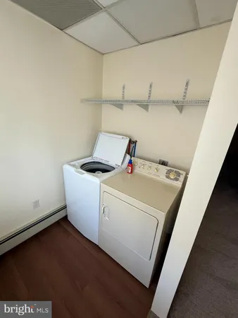 an empty room with a windows