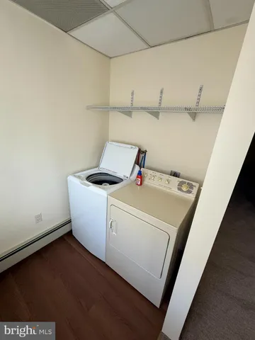 an empty room with a windows