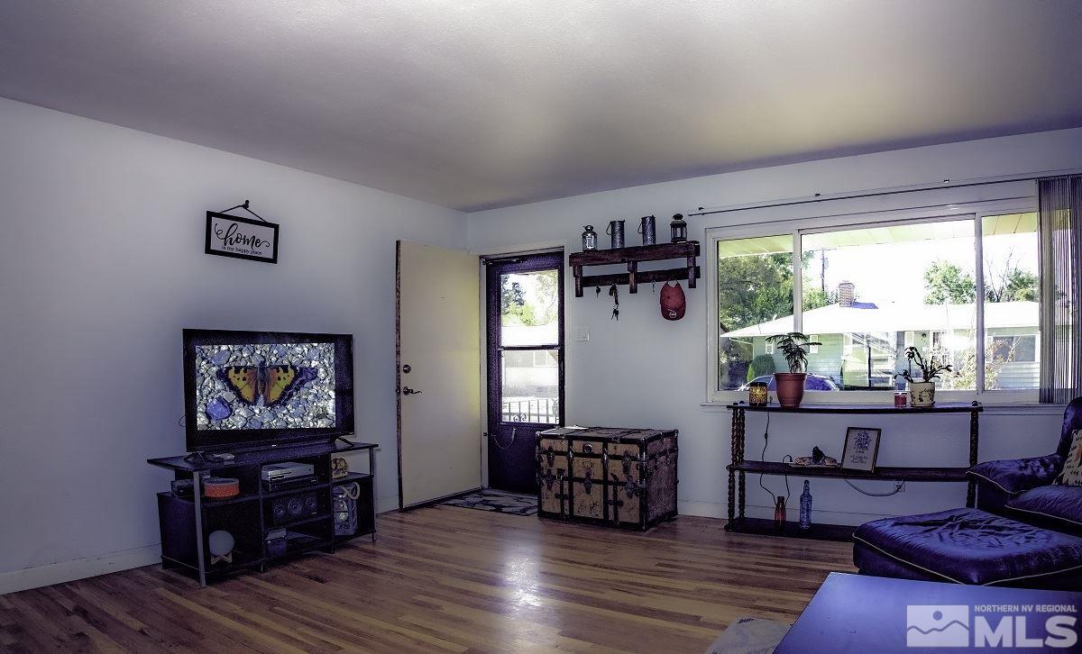 650 Lester Avenue Reno, NV 89502 - Photo 2 of 15 a living room with furniture and a window