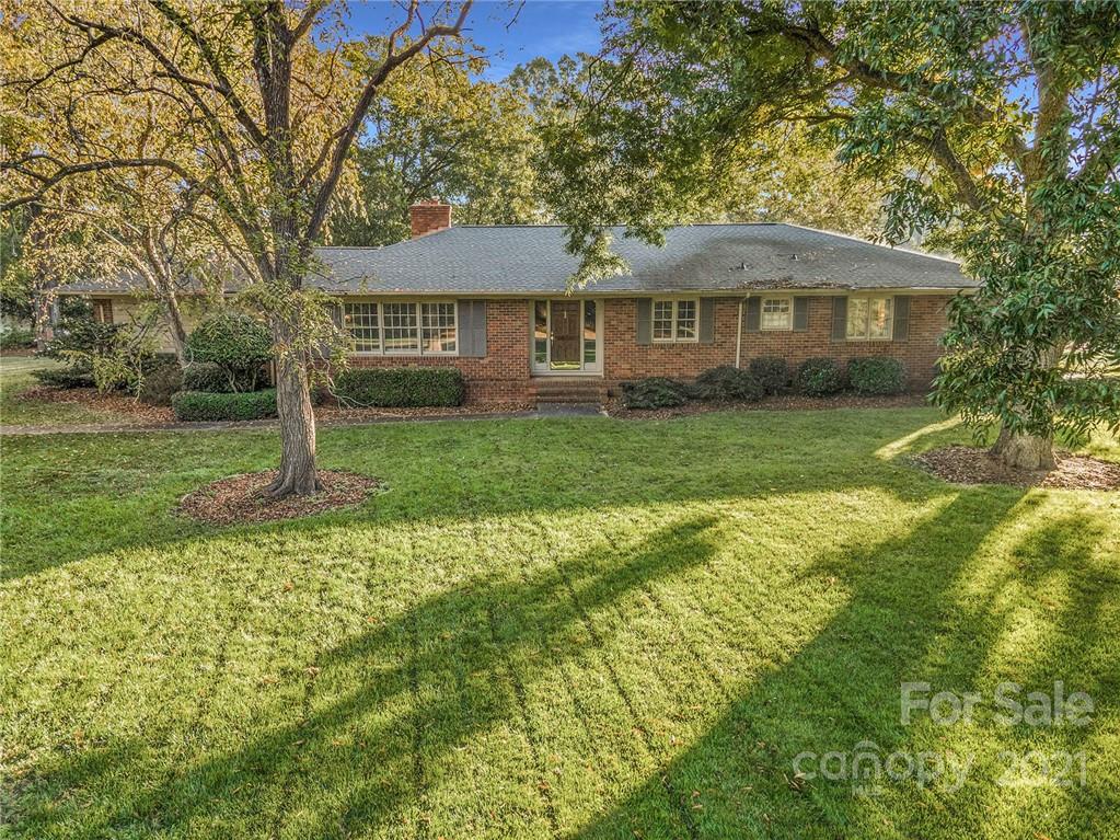 3301 Sharon Road Charlotte, NC 28211 - Photo 8 of 15 a front view of a house with a yard