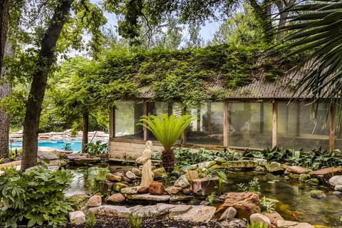 a view of a swimming pool with a lounge chairs