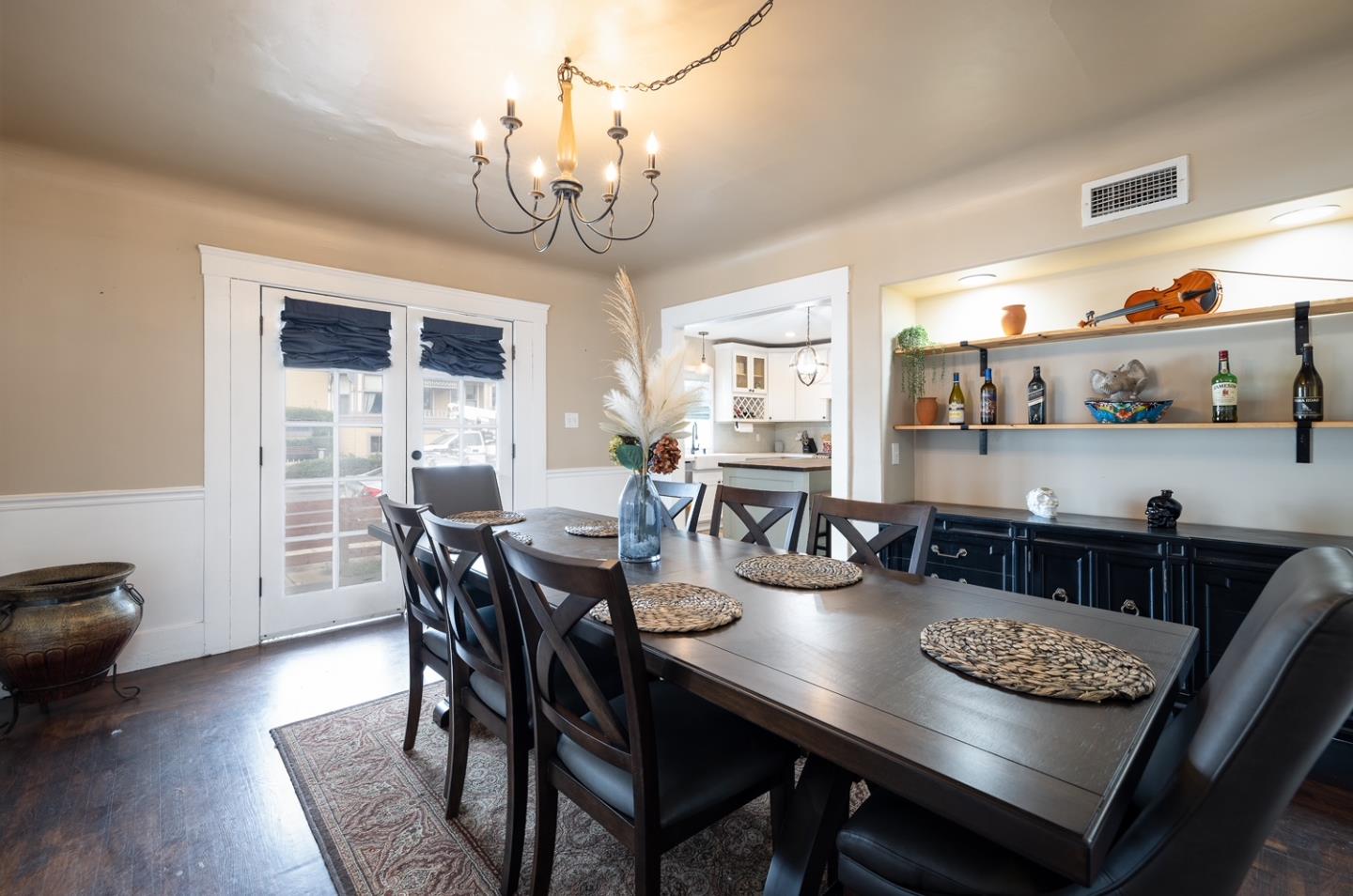 128 Central Avenue Salinas, CA 93901 - Photo 12 of 27 a view of a dining room with furniture and chandelier