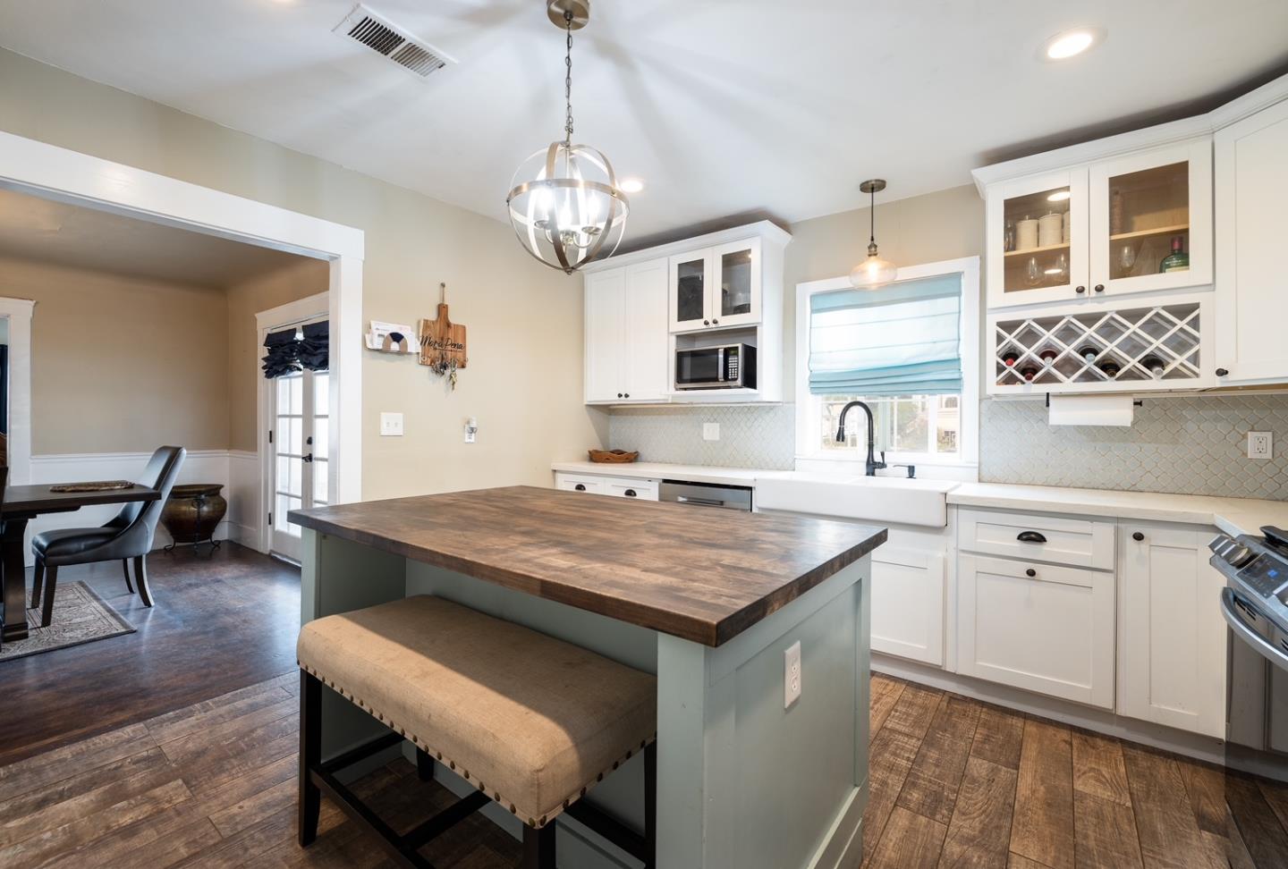 128 Central Avenue Salinas, CA 93901 - Photo 15 of 27 a view of a kitchen wooden cabinets and counter space