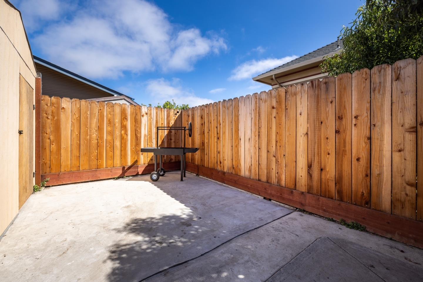 128 Central Avenue Salinas, CA 93901 - Photo 25 of 27 a view of an empty room with wooden walls and stairs