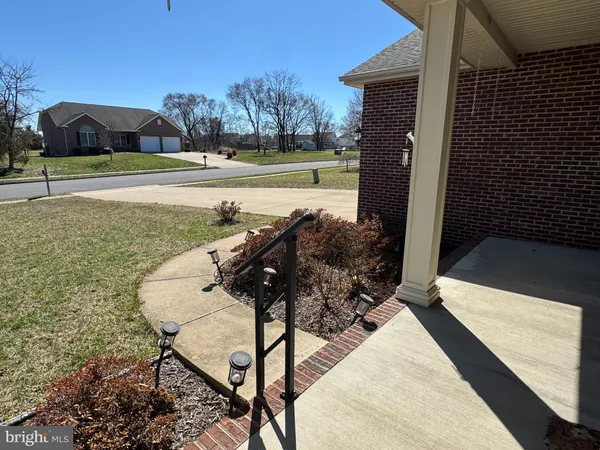 a view of a terrace with a yard