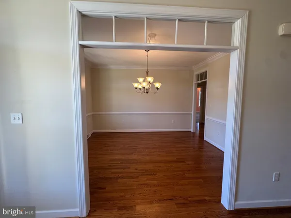 a view of a livingroom with wooden floor