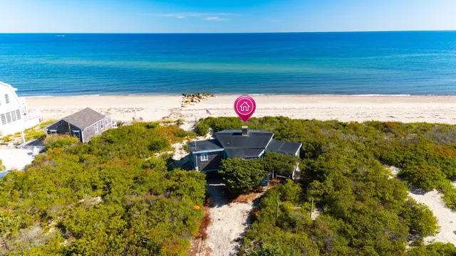 a view of a swimming pool with a yard