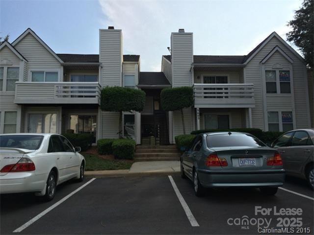 9629 Vinca Circle, Unit H Charlotte, NC 28213 - Photo 1 of 10 a car parked in front of a house