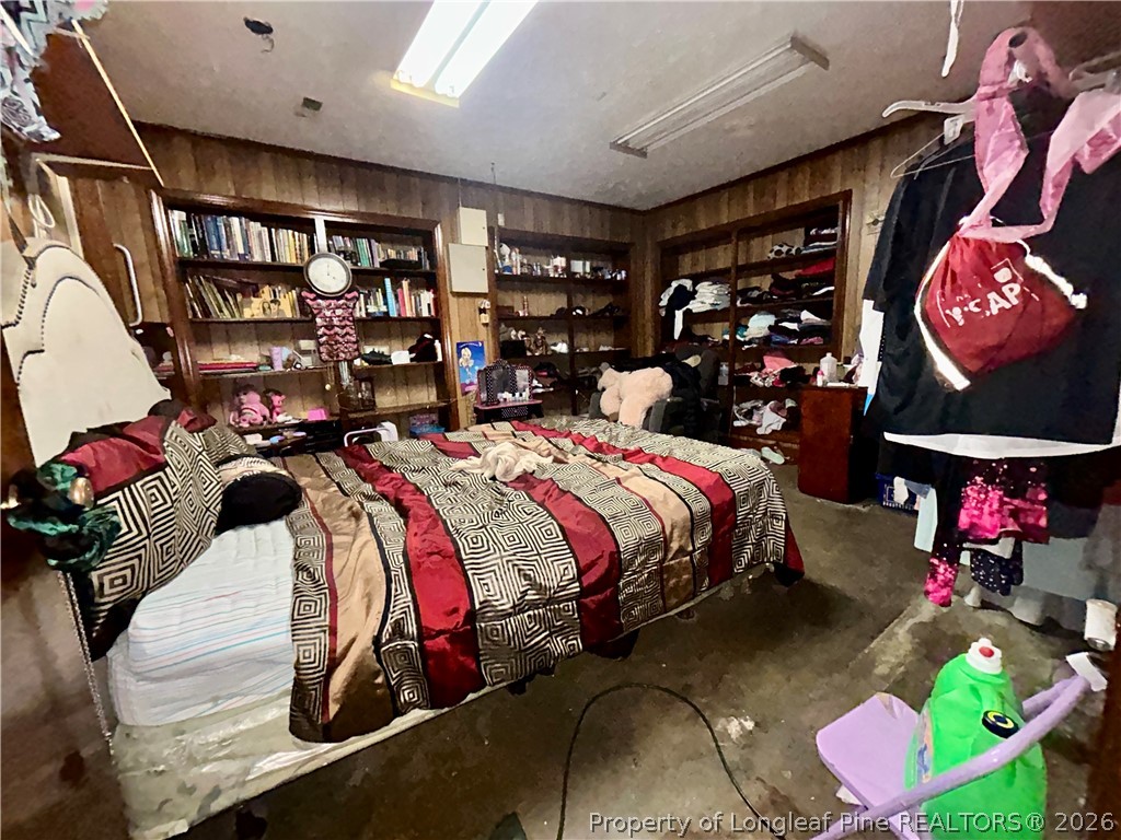 918 Opal Road Red Springs, NC 28377 - Photo 3 of 26 a bed room with a bed and a couch