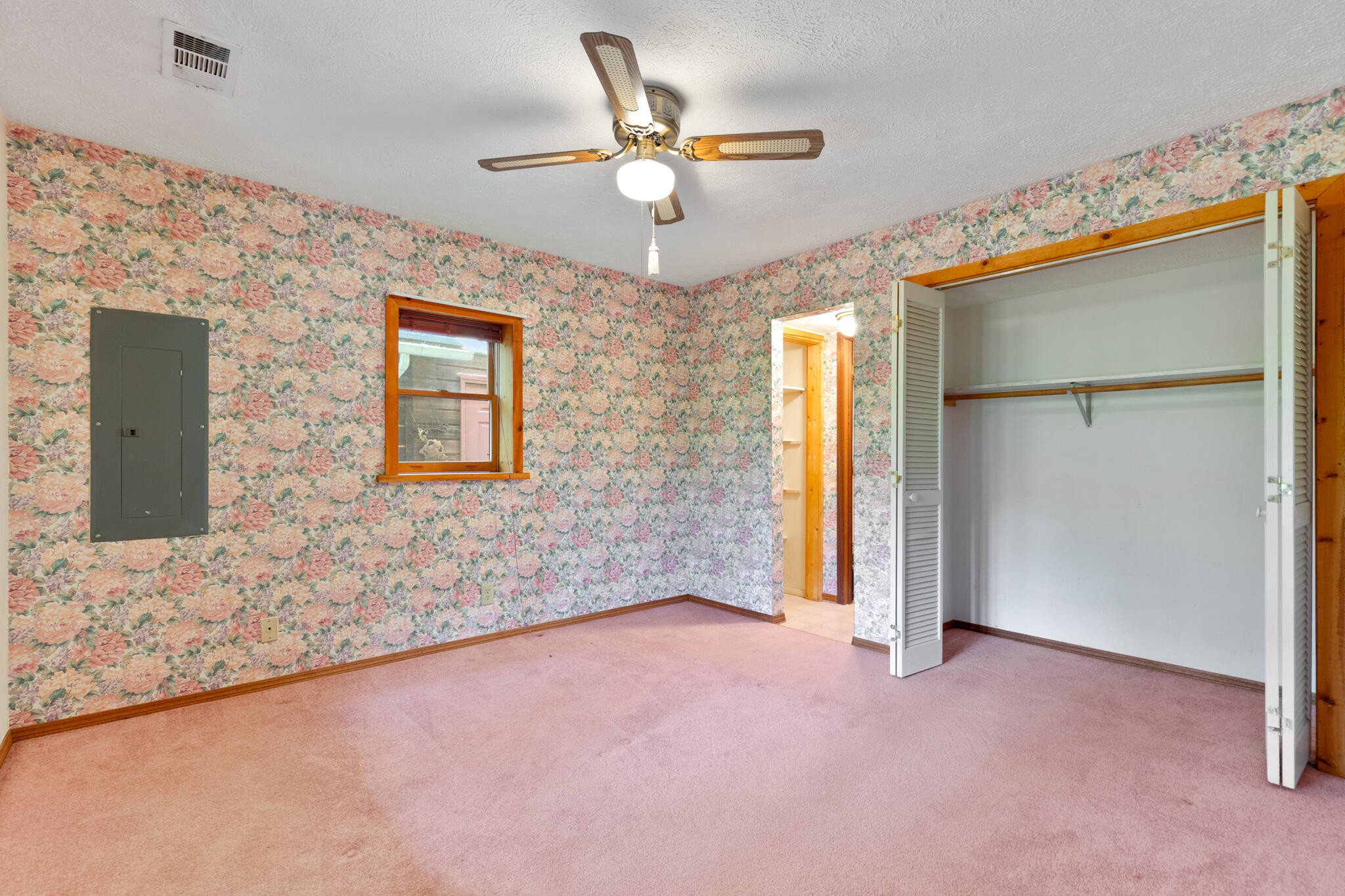 1724 Red Fox Ridge Way Sevierville, TN 37862 - Photo 37 of 59 a view of an empty room with a ceiling fan