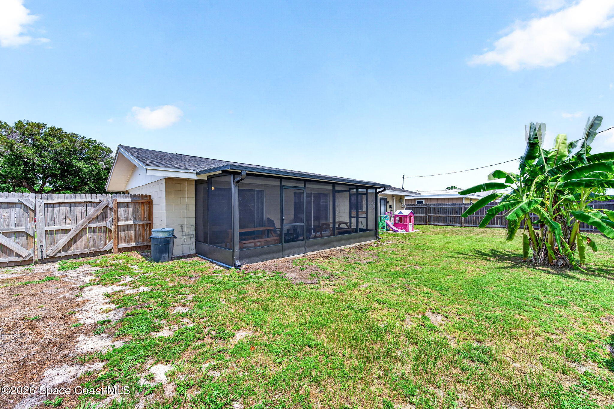 996 Botany Lane Rockledge, FL 32955 - Photo 32 of 35 a view of a house with a yard