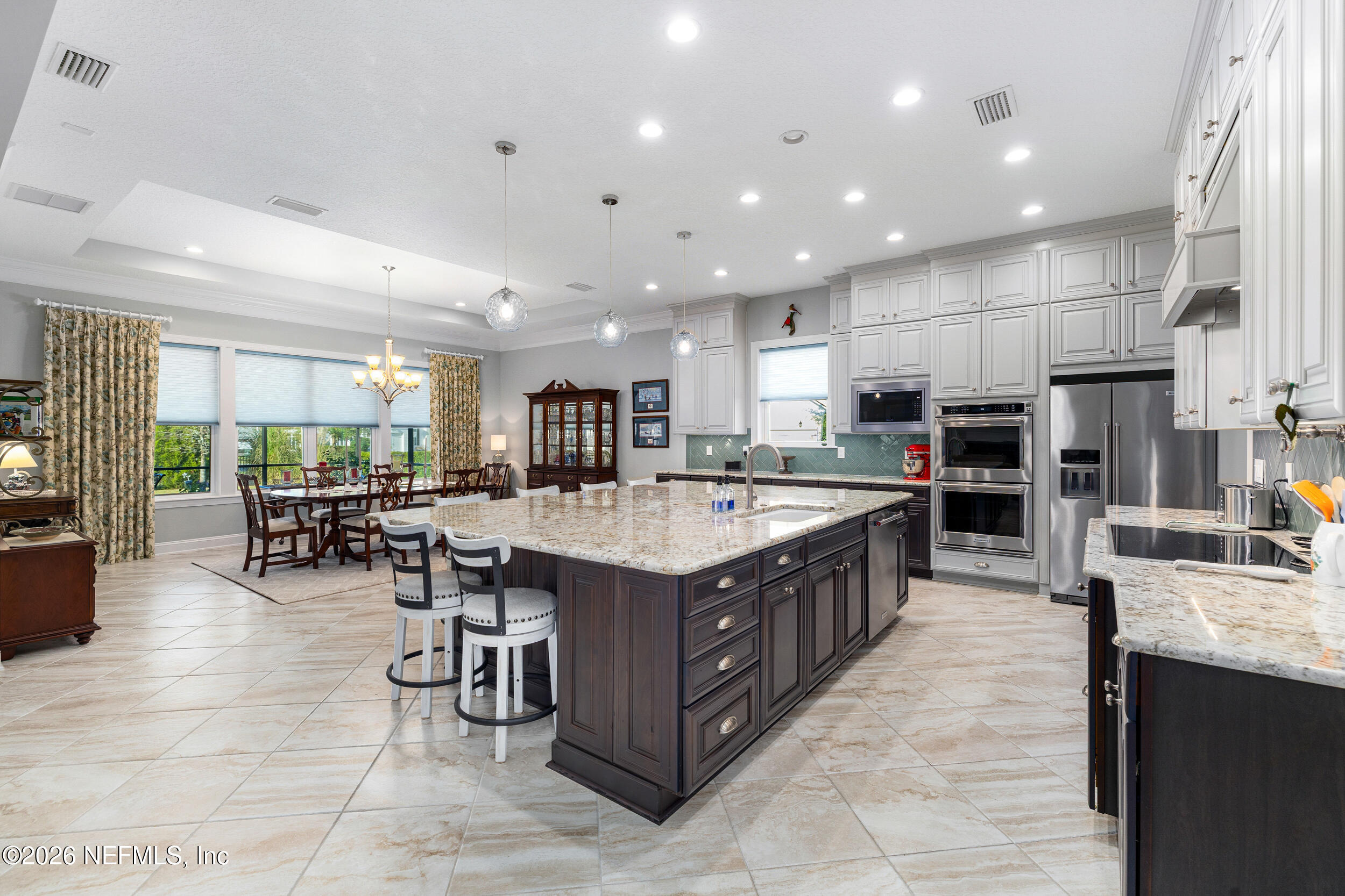 220 Honey Blossom Road St. Johns, FL 32259 - Photo 27 of 99 a kitchen with stainless steel appliances granite countertop lots of counter top and sink