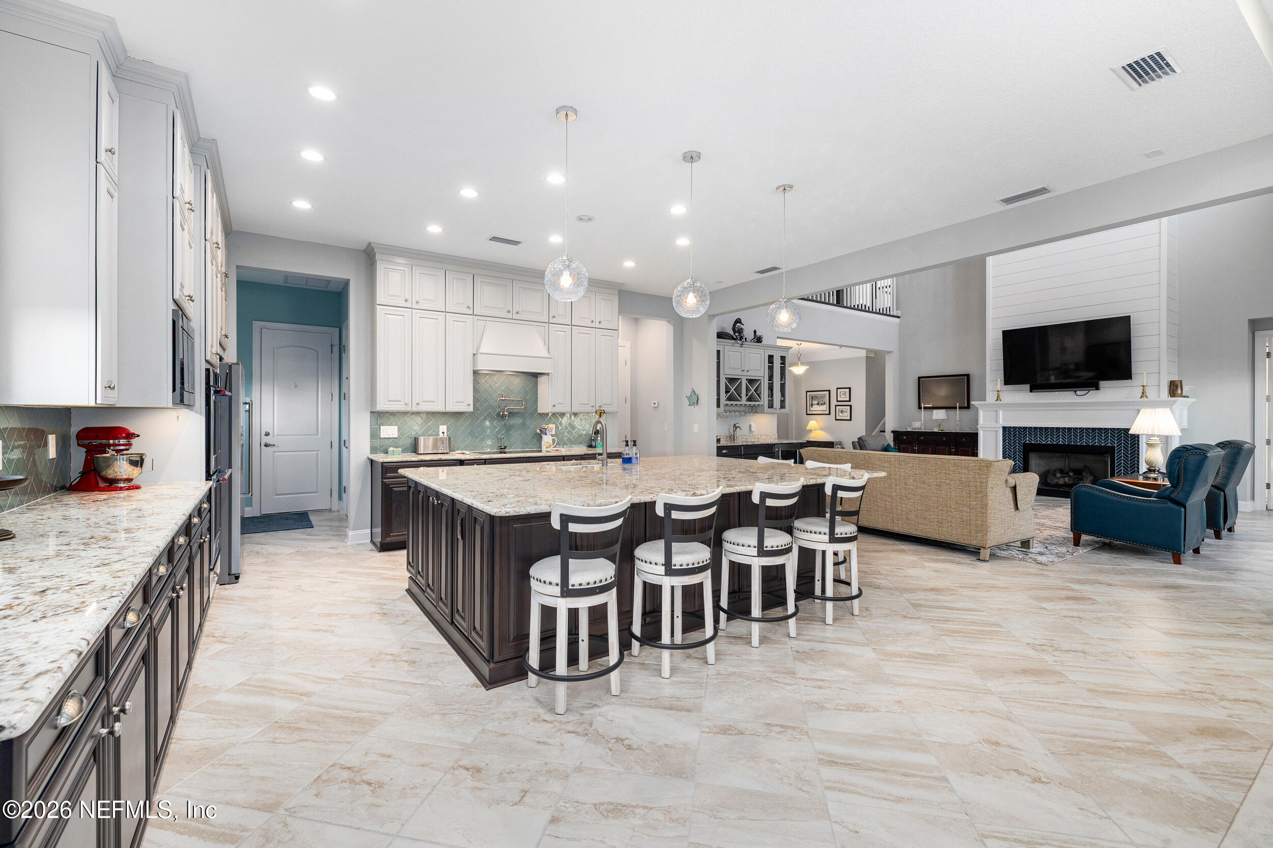 220 Honey Blossom Road St. Johns, FL 32259 - Photo 29 of 99 a large kitchen with lots of counter and chairs