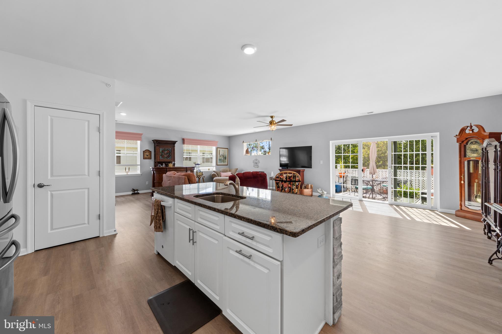 24525 Merlot Drive Lewes, DE 19958 - Photo 16 of 40 a view of living room with furniture and wooden floor