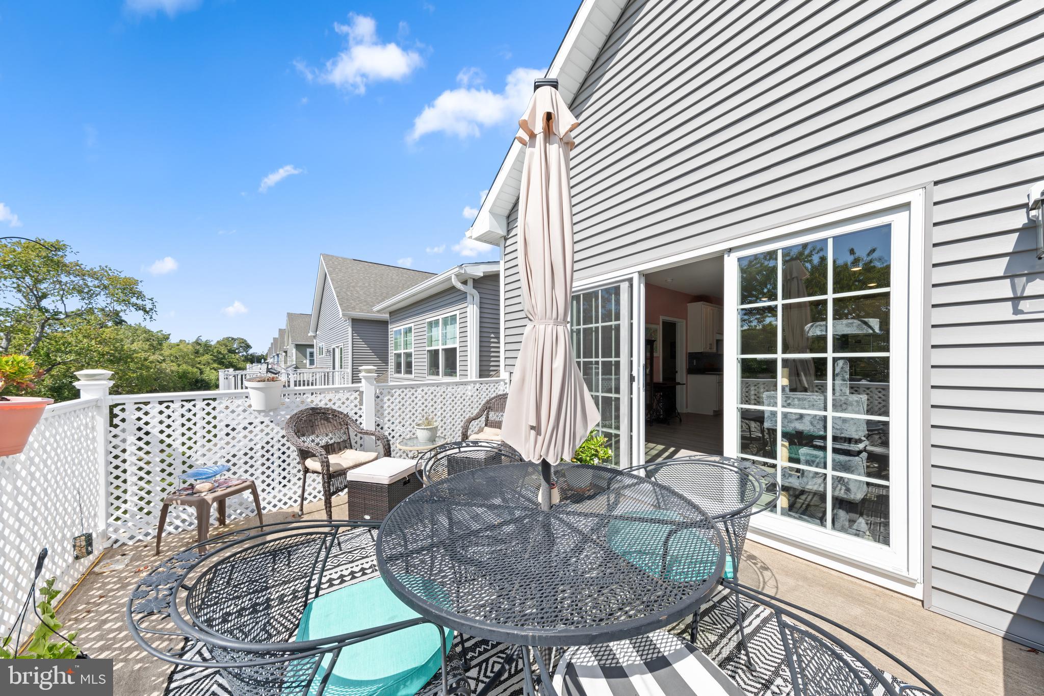 24525 Merlot Drive Lewes, DE 19958 - Photo 40 of 40 a view of a house with backyard and sitting area