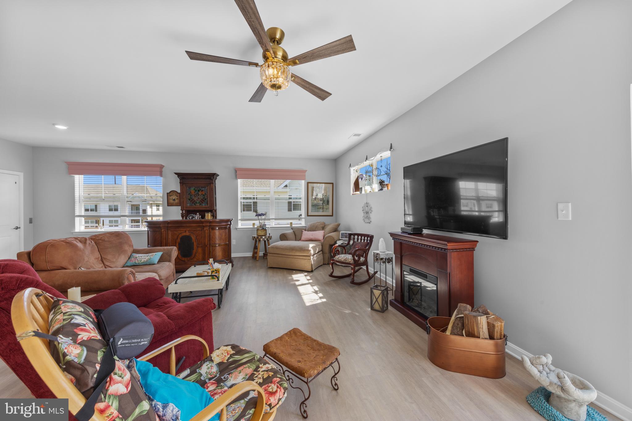 24525 Merlot Drive Lewes, DE 19958 - Photo 6 of 40 a living room with furniture and a flat screen tv