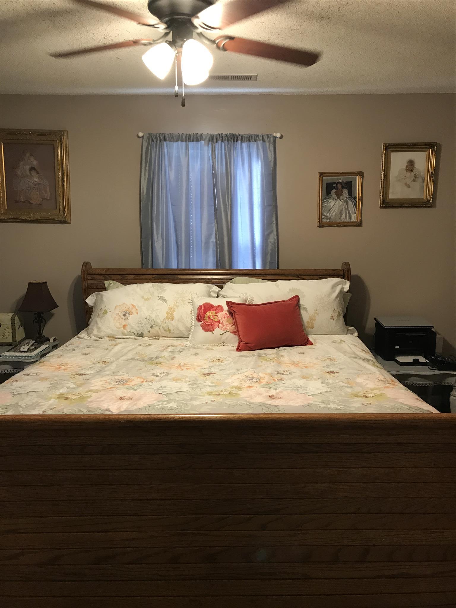 82 Five Points Road Loretto, TN 38469 - Photo 12 of 24 a bedroom with a bed and window