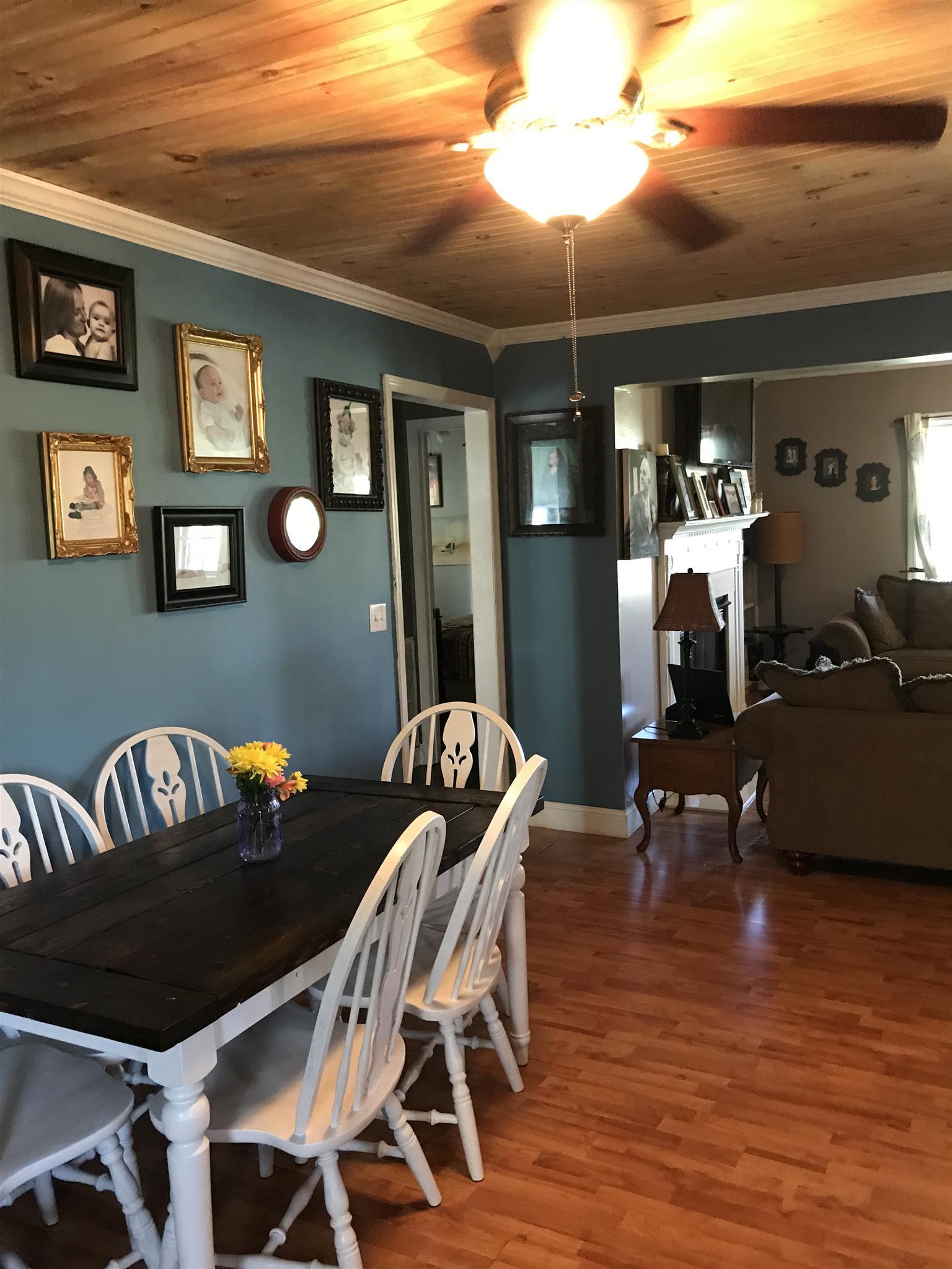 82 Five Points Road Loretto, TN 38469 - Photo 8 of 24 a living room with furniture and wooden floor