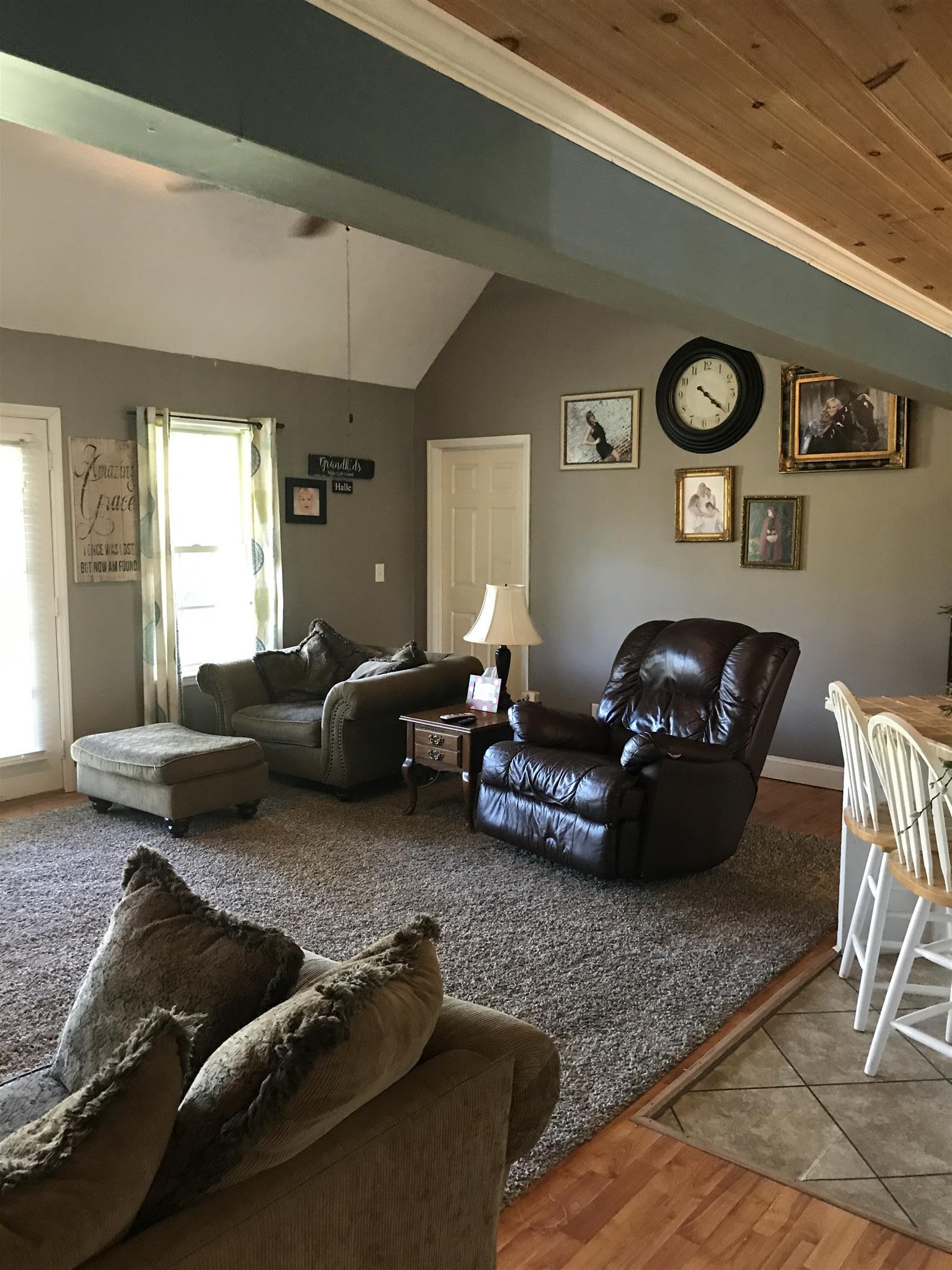 82 Five Points Road Loretto, TN 38469 - Photo 9 of 24 a living room with furniture rug and window