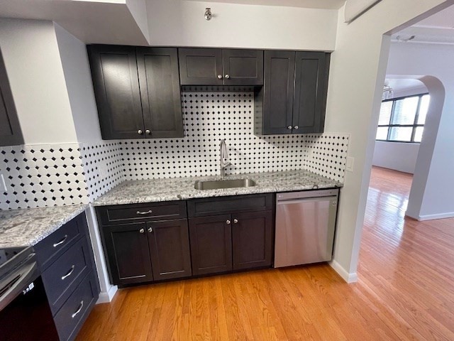 1731 Beacon Street, Unit 512 Brookline, MA 02445 - Photo 13 of 41 a bathroom with a sink vanity granite and a mirror