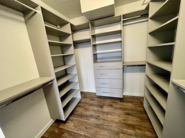 1731 Beacon Street, Unit 512 Brookline, MA 02445 - Photo 24 of 41 a view of walk in closet with empty racks
