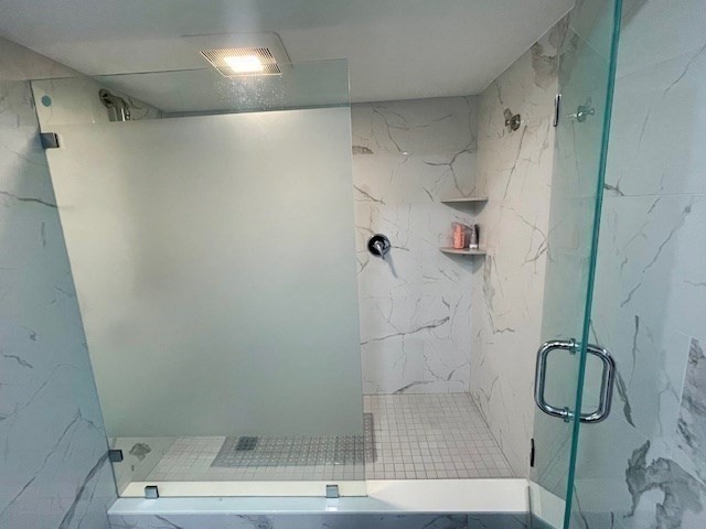 1731 Beacon Street, Unit 512 Brookline, MA 02445 - Photo 36 of 41 a bathroom with a shower