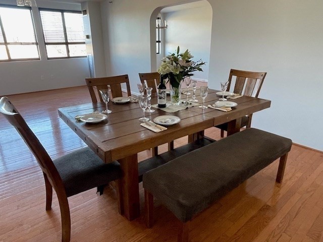 1731 Beacon Street, Unit 512 Brookline, MA 02445 - Photo 7 of 41 a view of a dining room with furniture and wooden floor
