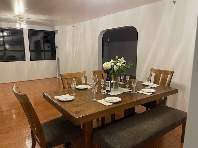1731 Beacon Street, Unit 512 Brookline, MA 02445 - Photo 8 of 41 a view of a dining room with furniture and wooden floor