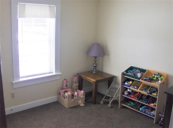 84 Warwick Road Northfield, MA 01360 - Photo 11 of 30 a room with toys and a wooden floor
