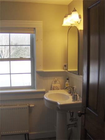 84 Warwick Road Northfield, MA 01360 - Photo 14 of 30 a bathroom with a sink and a mirror