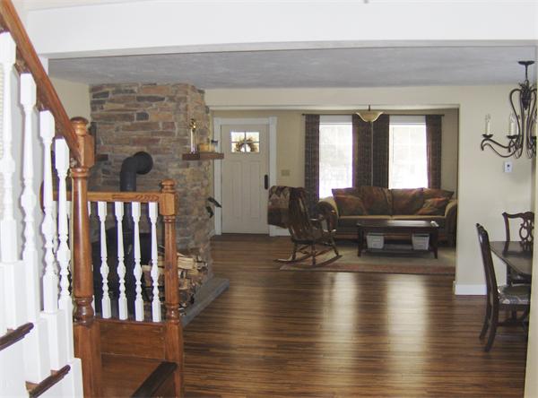 84 Warwick Road Northfield, MA 01360 - Photo 15 of 30 a living room with furniture and a fireplace