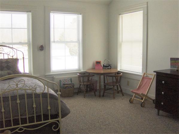 84 Warwick Road Northfield, MA 01360 - Photo 19 of 30 a bedroom with a bed and a window