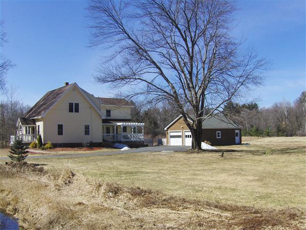 84 Warwick Road Northfield, MA 01360 - Photo 28 of 30 a large house with a large tree in front of it