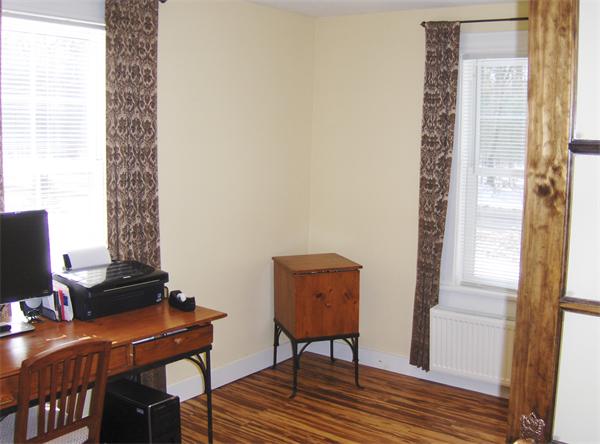 84 Warwick Road Northfield, MA 01360 - Photo 5 of 30 a view of a workspace with furniture and a window