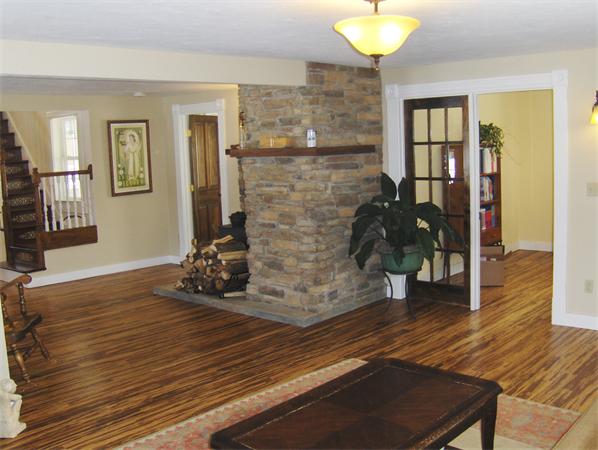 84 Warwick Road Northfield, MA 01360 - Photo 6 of 30 a room with hard wood floors and glass door