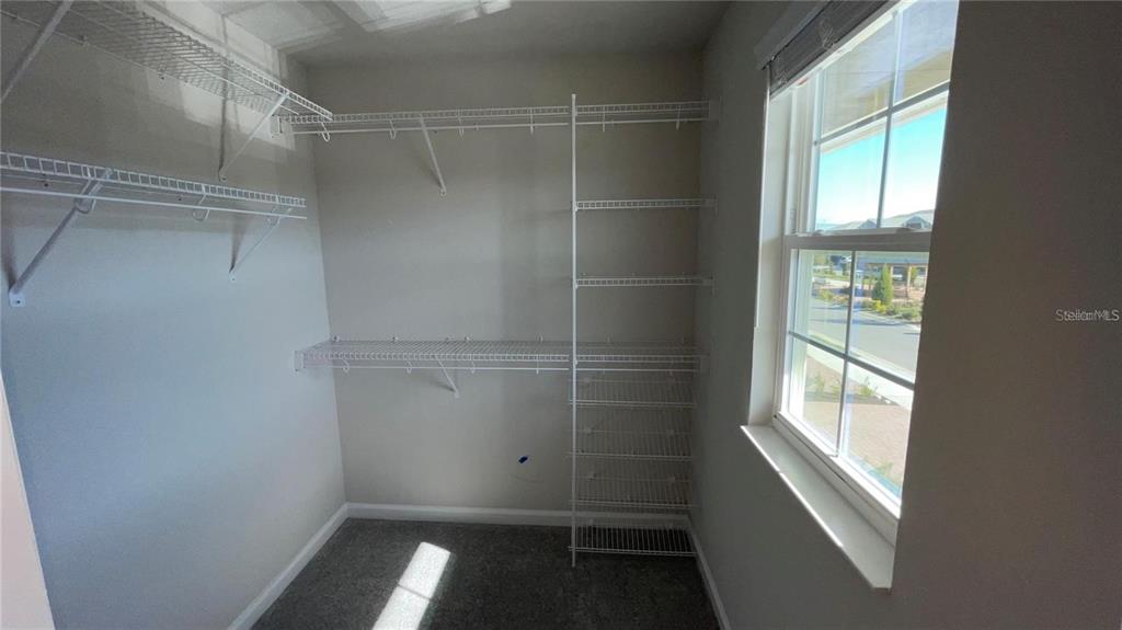5175 Tyson Ranch Boulevard Orlando, FL 32824 - Photo 13 of 21 a view of walk in closet with window