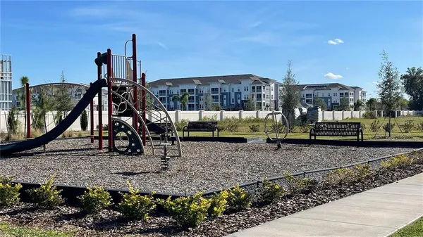 a view of a park with swings