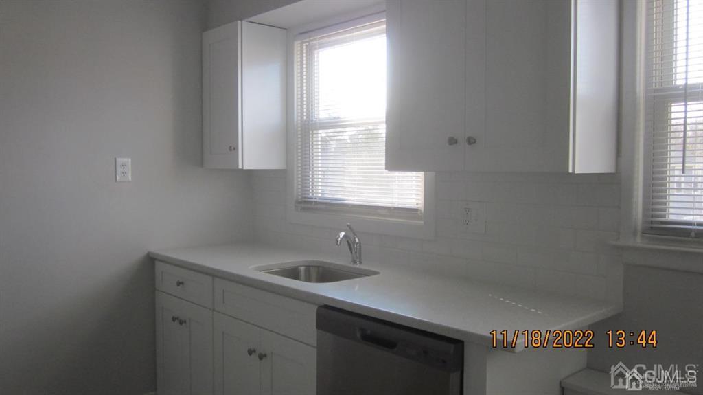 B Plainfield Road Edison, NJ 08820 - Photo 3 of 7 a room with a sink a window and cabinets