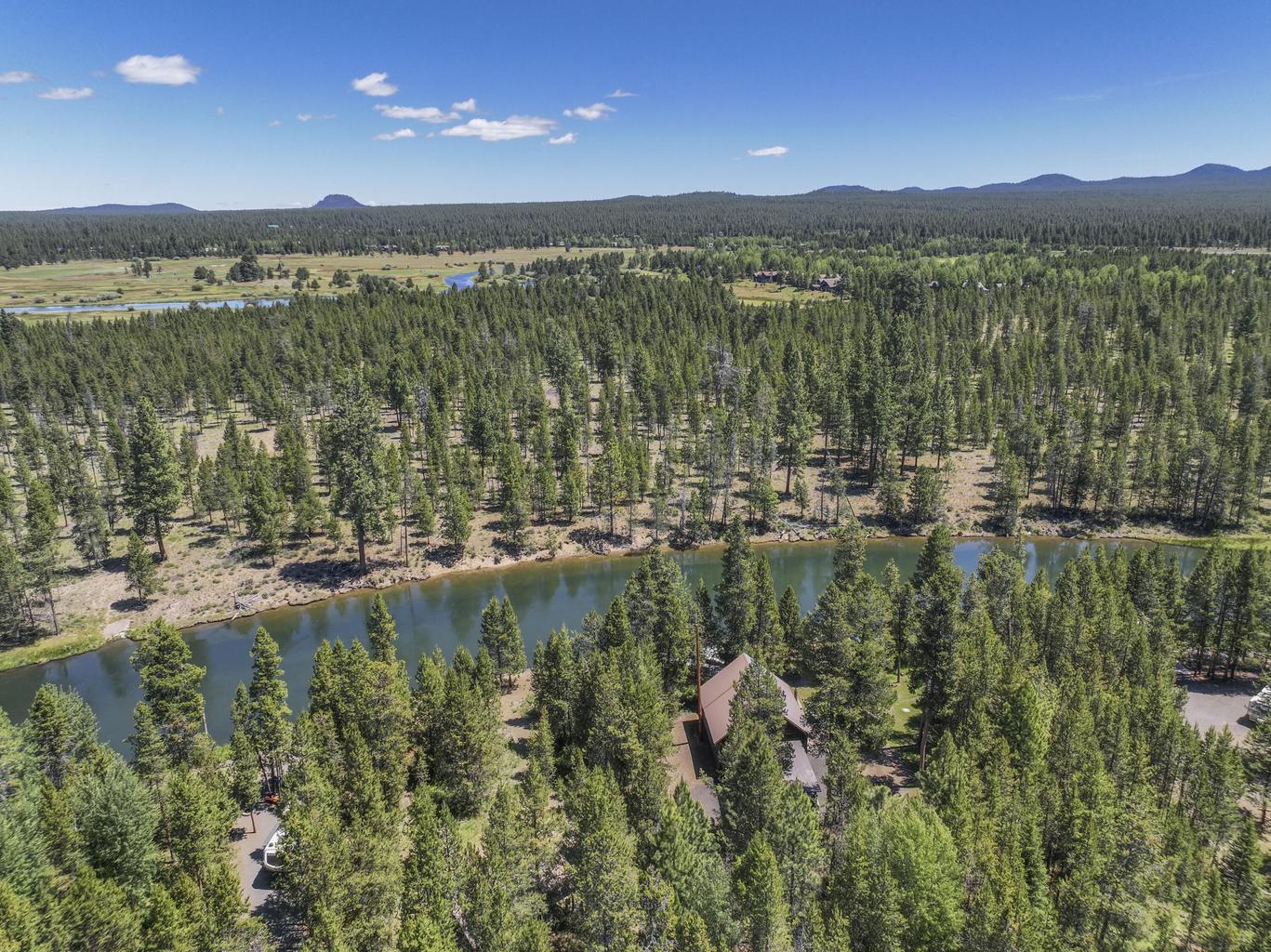 56446 Eclipse Drive Bend, OR 97707 - Photo 36 of 42 a view of lake with a city