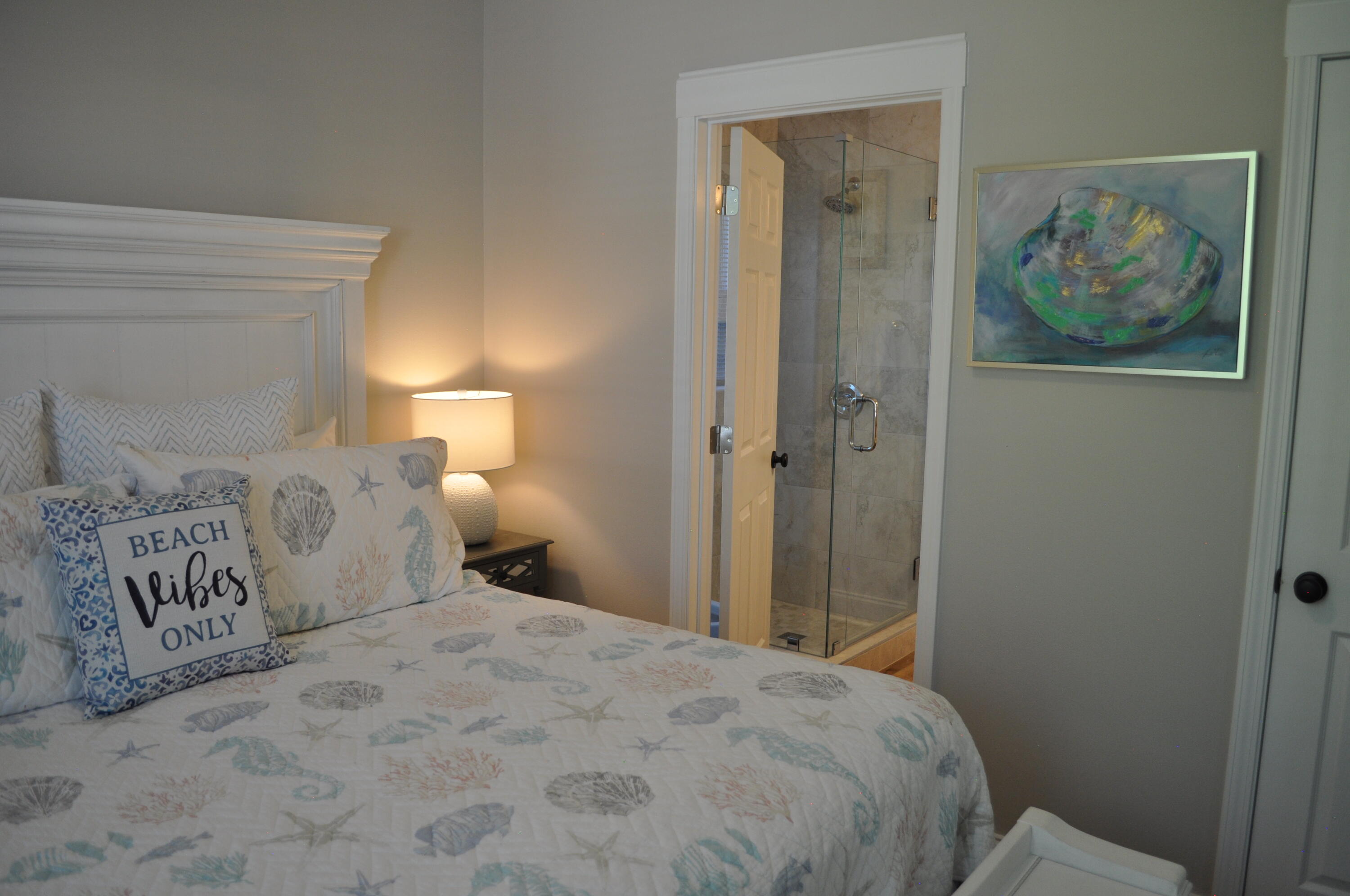 136 Shorebird Drive, Unit 724 Santa Rosa Beach, FL 32459 - Photo 19 of 49 a bedroom with a bed and painting on the wall