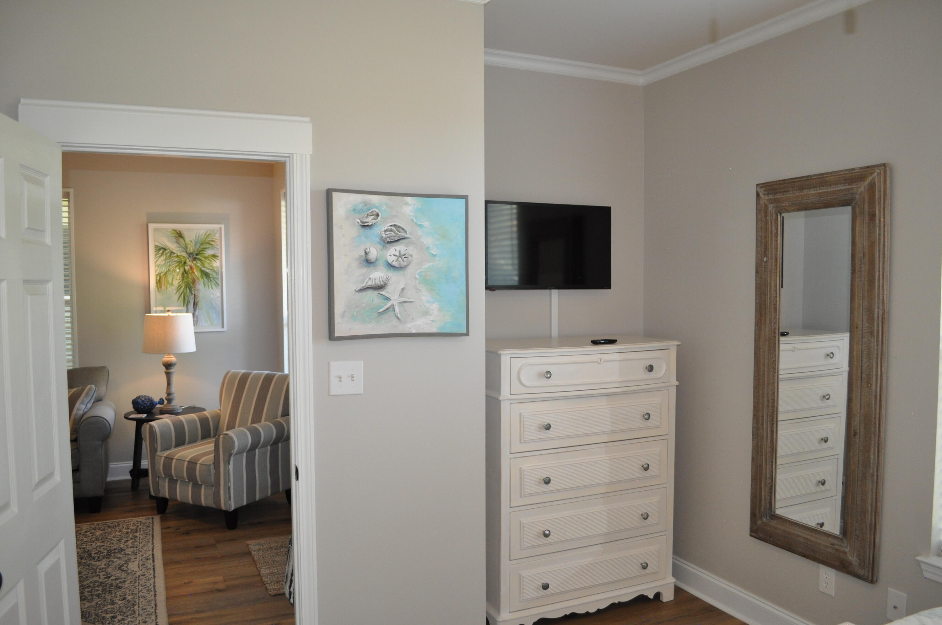 136 Shorebird Drive, Unit 724 Santa Rosa Beach, FL 32459 - Photo 21 of 49 a living room with furniture and a flat screen tv