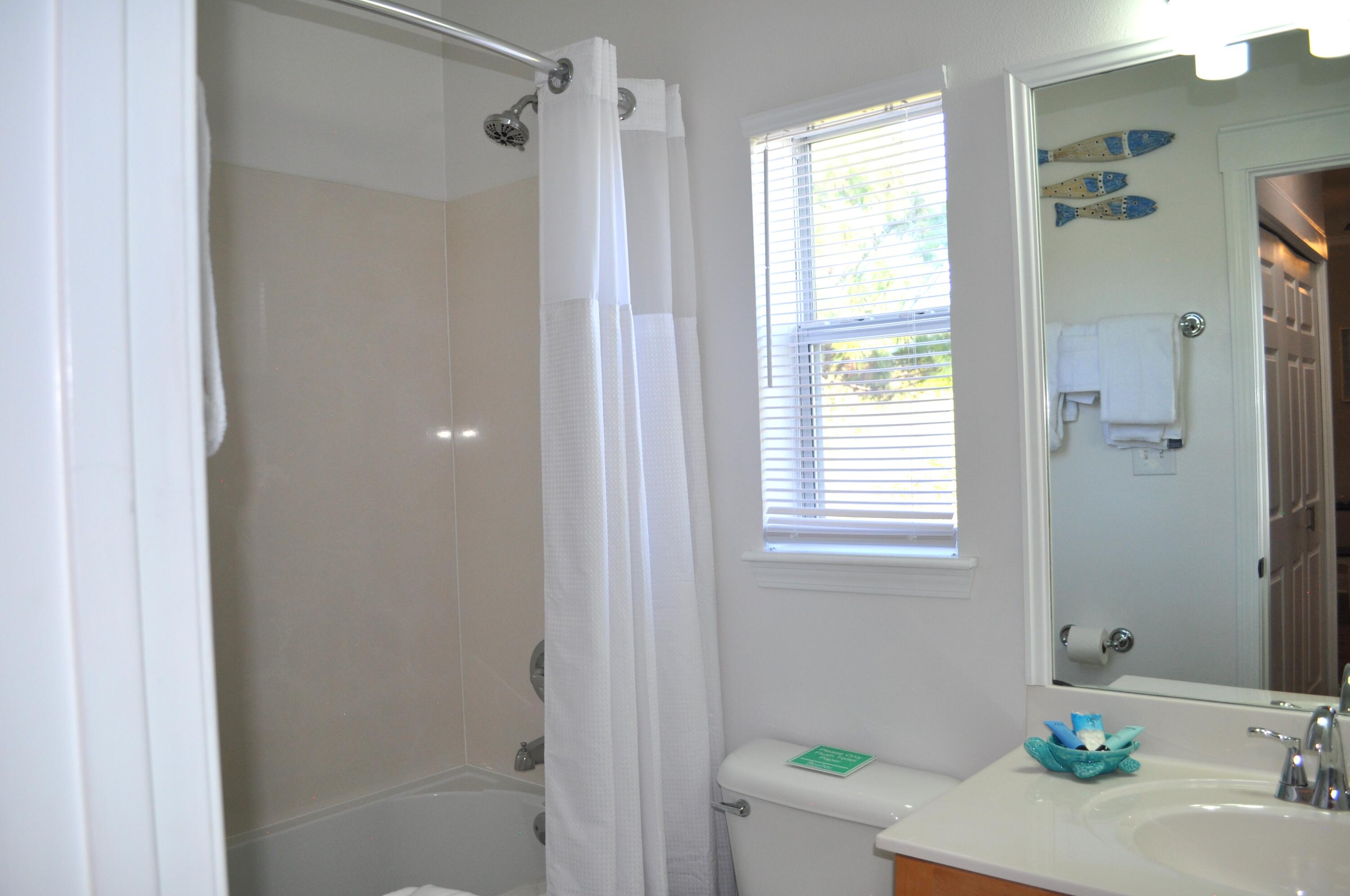 136 Shorebird Drive, Unit 724 Santa Rosa Beach, FL 32459 - Photo 28 of 49 a bathroom with a sink and a mirror