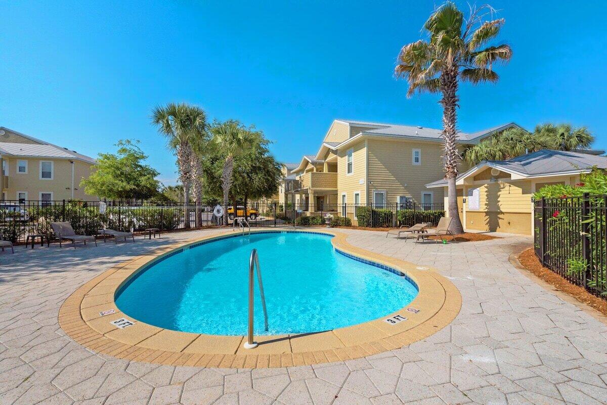 136 Shorebird Drive, Unit 724 Santa Rosa Beach, FL 32459 - Photo 39 of 49 a view of a swimming pool with a patio