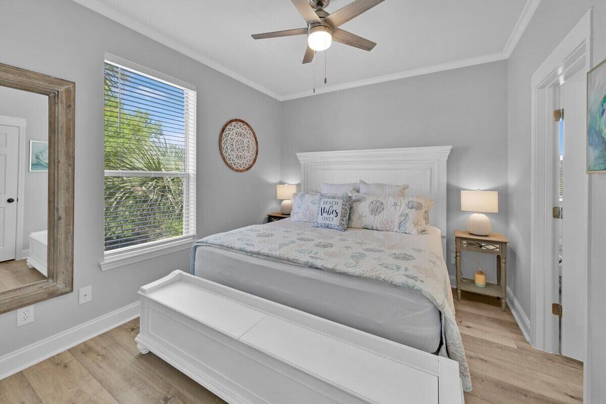 136 Shorebird Drive, Unit 724 Santa Rosa Beach, FL 32459 - Photo 4 of 49 a bedroom with a large bed and a window
