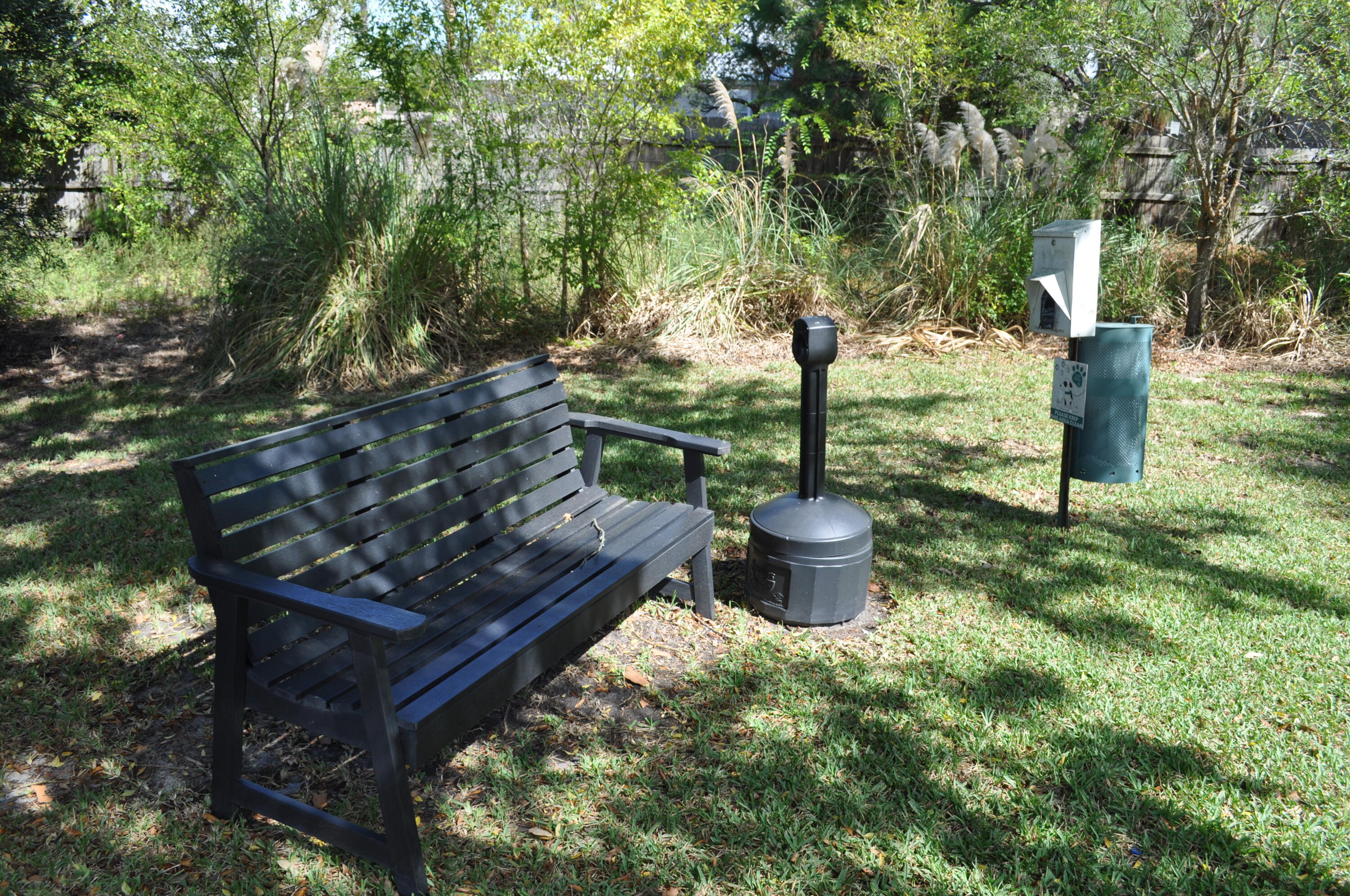 136 Shorebird Drive, Unit 724 Santa Rosa Beach, FL 32459 - Photo 44 of 49 a view of a backyard with sitting area