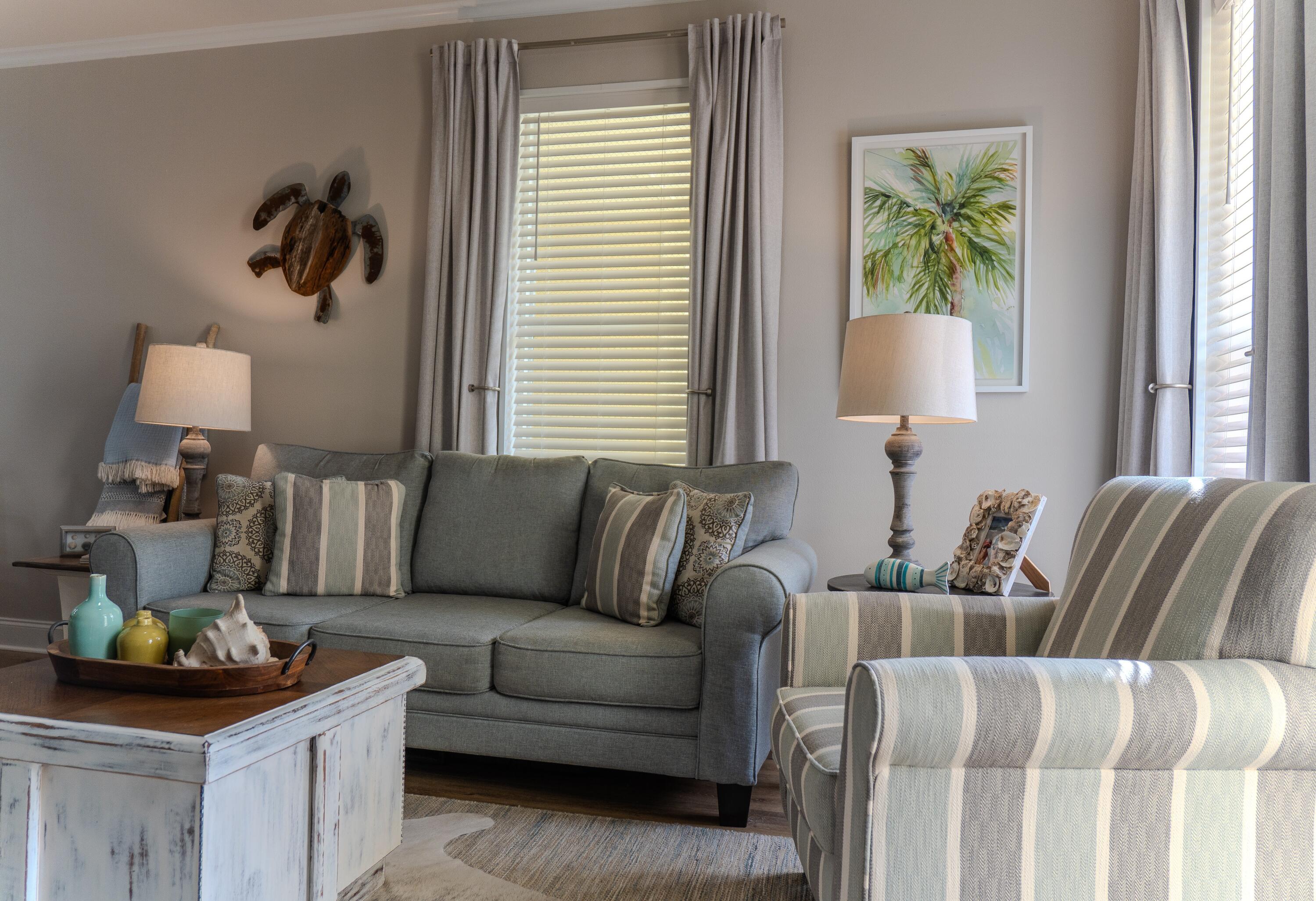 136 Shorebird Drive, Unit 724 Santa Rosa Beach, FL 32459 - Photo 9 of 49 a living room with furniture and a window