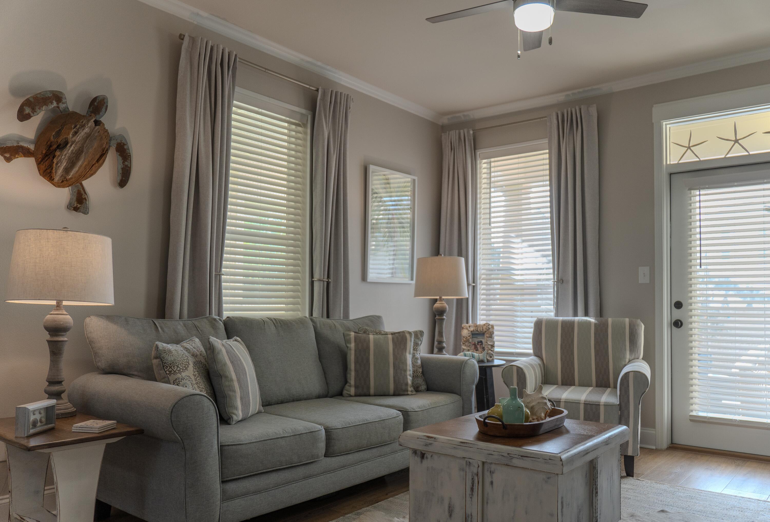 136 Shorebird Drive, Unit 724 Santa Rosa Beach, FL 32459 - Photo 10 of 49 a living room with furniture and a large window