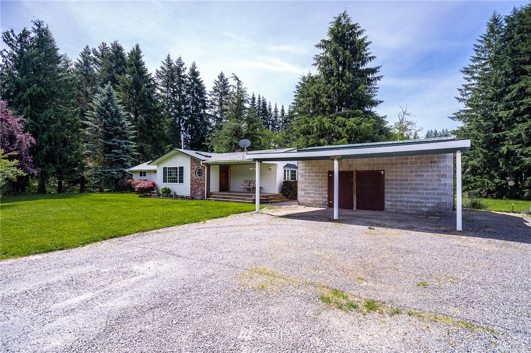 1561 King Road Winlock, WA 98596 - Photo 3 of 23 a front view of house with yard and green space