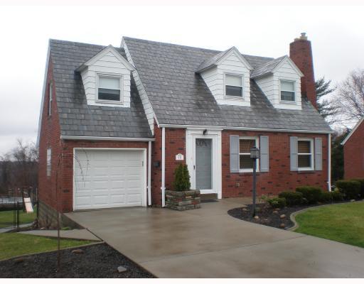 616 Greenlee Road Whitehall, PA 15227 - Photo 1 of 8 Exterior Front. Great curb appeal for this three bedroom charming cape cod. Upper level has extra smaller room that can be used as large walk in closet or computer room. Newer concrete driveway and sidewalks plus extra parking pad off street.