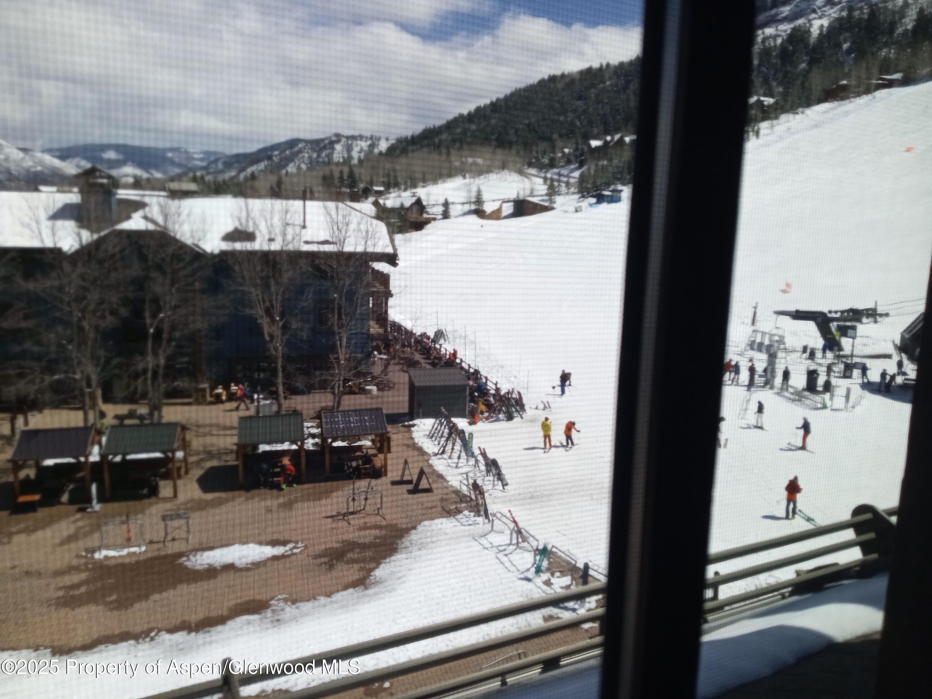 75 Prospector Road, Unit 8408 WINTER INTEREST #6 Aspen, CO 81611 - Photo 30 of 32 a view of city from balcony